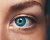 selective focus of blue-eyed person
